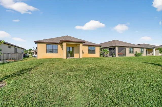a view of a lake with a big yard