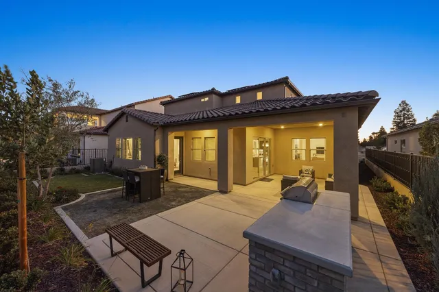 a front view of a house with patio