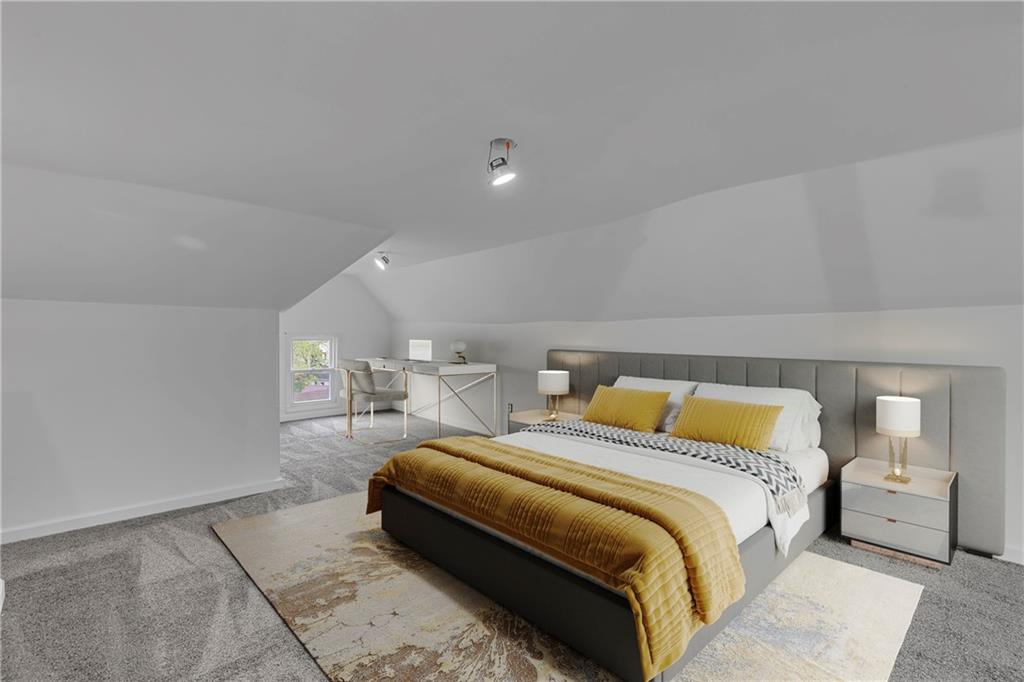 193 Virginia Avenue Rochester, PA 15074 - Photo 27 of 37 a bedroom with a bed and a night stand
