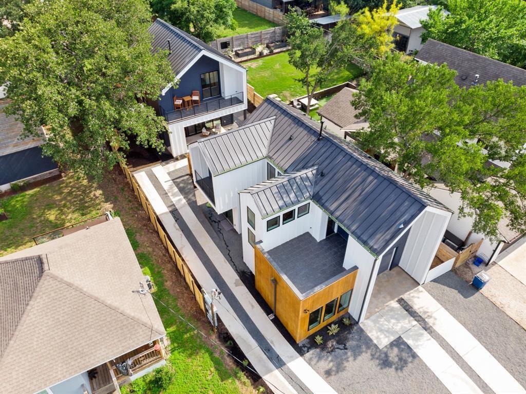 2919 East 13th Street, Unit 2 Austin, TX 78702 - Photo 18 of 20 a view of a roof deck with wooden floor and fence