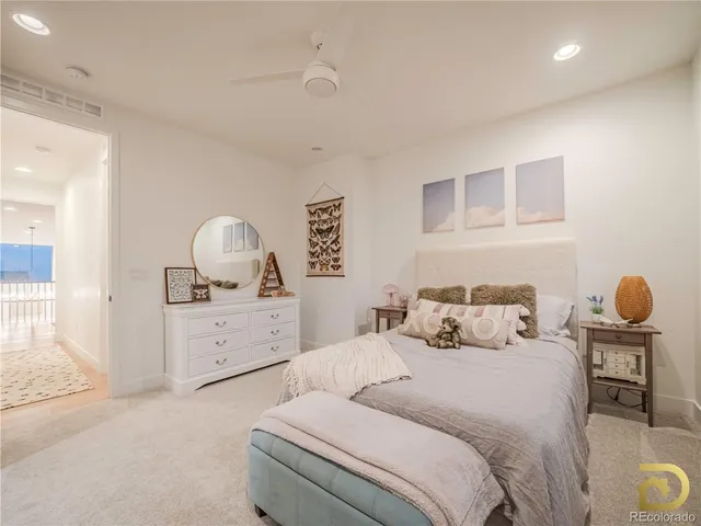 a bedroom with bed and window