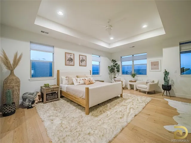 a living room with furniture and white walls
