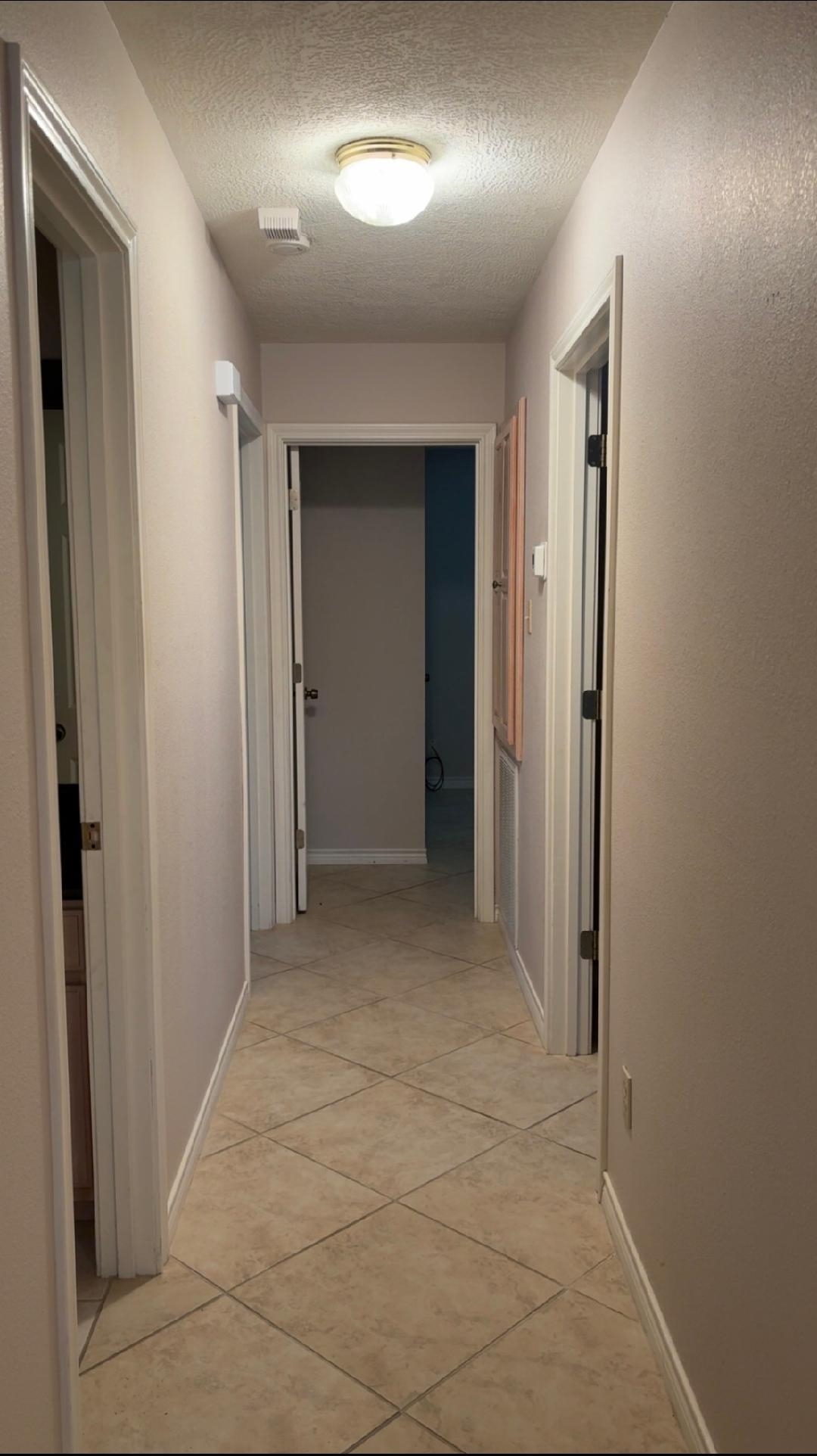 4665 Glen Oaks Circle Beaumont, TX 77708 - Photo 11 of 20 a view of a hallway