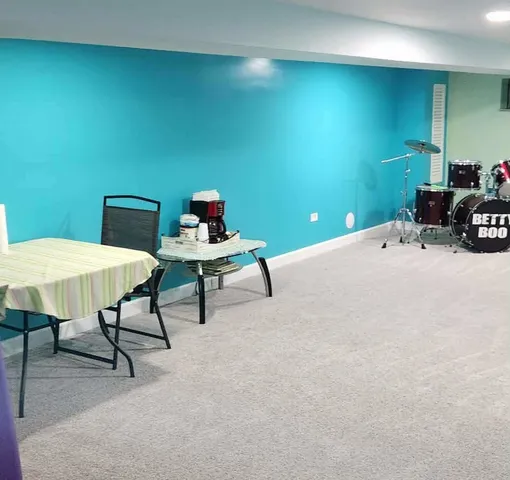 a workspace with furniture and a chair