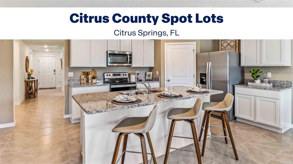 7780 North Keystone Drive Dunnellon, FL 34433 - Photo 21 of 21 a kitchen with stainless steel appliances kitchen island granite countertop a sink and cabinets