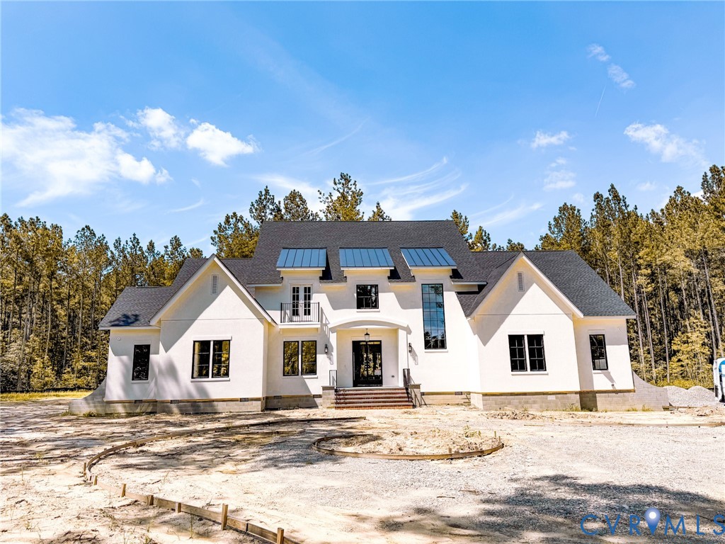 Front of the Home Feat Stucco, Metal Roof Detailin