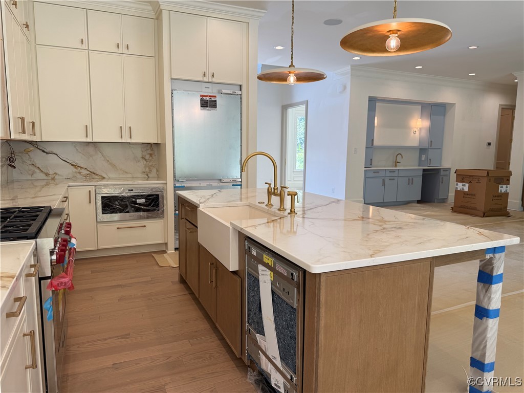 1120 Cardinal Crest Terrace Midlothian, VA 23113 - Photo 11 of 44 a kitchen with stainless steel appliances a sink a stove and cabinets