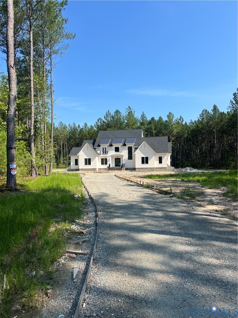 1120 Cardinal Crest Terrace Midlothian, VA 23113 - Photo 2 of 44 a view of green field with house in background