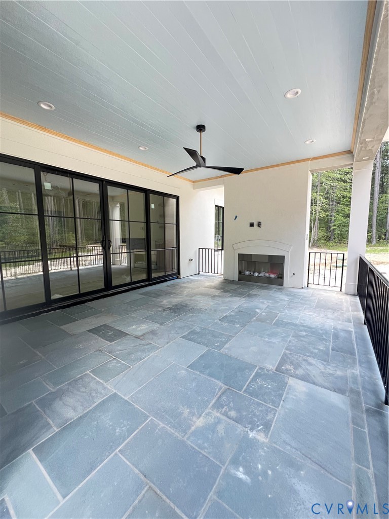 1120 Cardinal Crest Terrace Midlothian, VA 23113 - Photo 29 of 44 Rear Covered Porch Featuring Blue Stone & Gas Fire