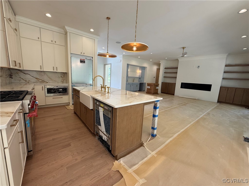 1120 Cardinal Crest Terrace Midlothian, VA 23113 - Photo 8 of 44 a large kitchen with stainless steel appliances lots of counter space and wooden floor