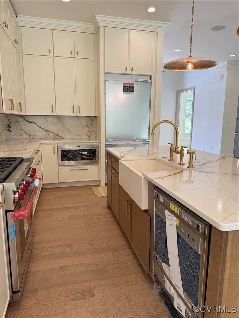 1120 Cardinal Crest Terrace Midlothian, VA 23113 - Photo 10 of 44 a kitchen with a sink stove and cabinets