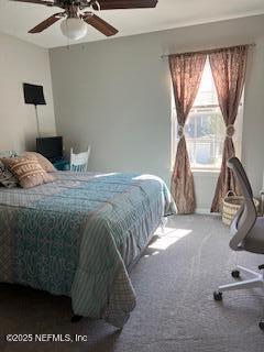 385 Scrub Jay Drive St. Augustine, FL 32092 - Photo 13 of 16 a bedroom with a bed and a window