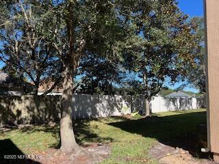 385 Scrub Jay Drive St. Augustine, FL 32092 - Photo 14 of 16 a view of a yard
