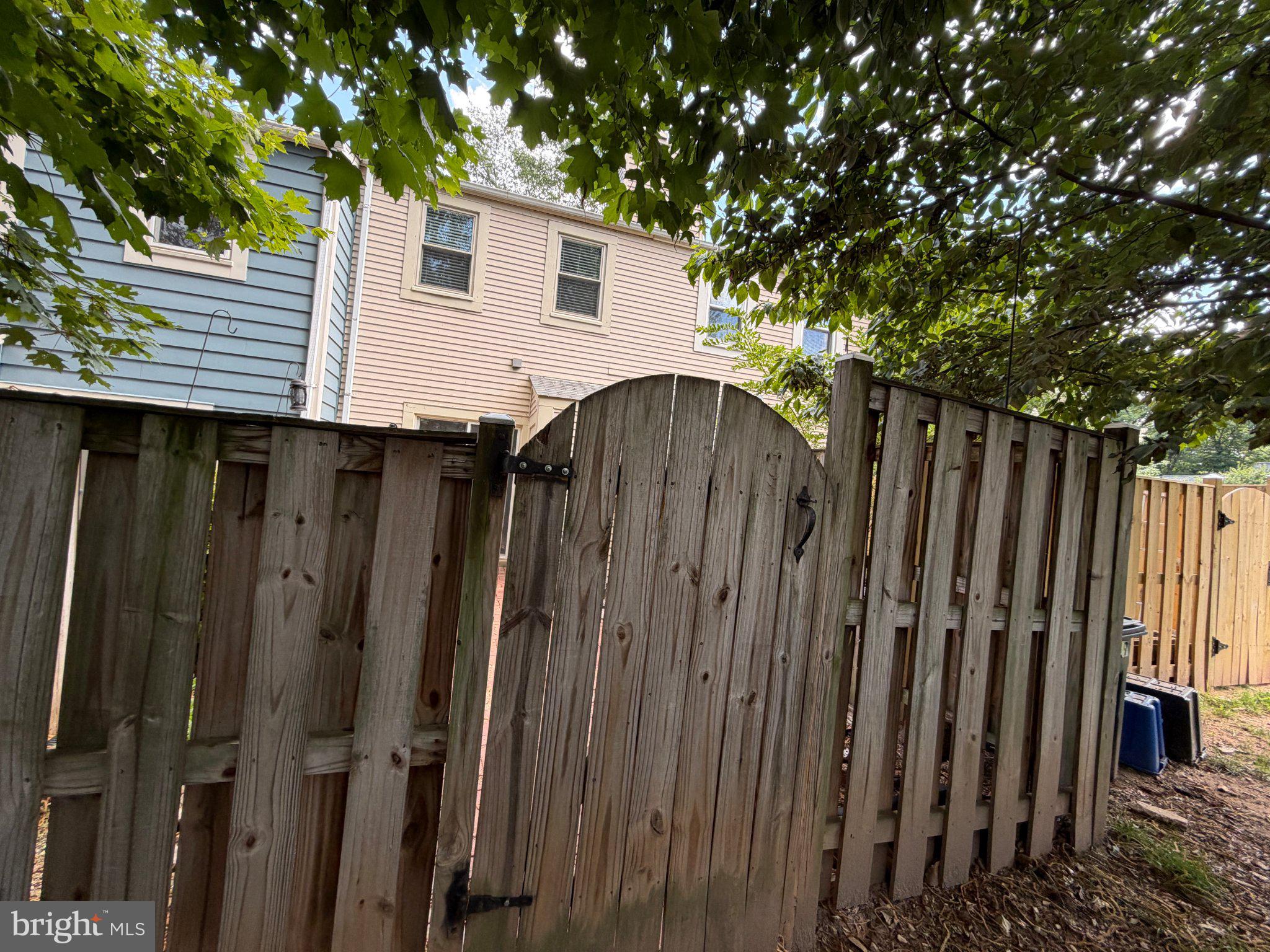 2121 Whisper Way Reston, VA 20191 - Photo 55 of 61 Charming gate to a hidden retreat.