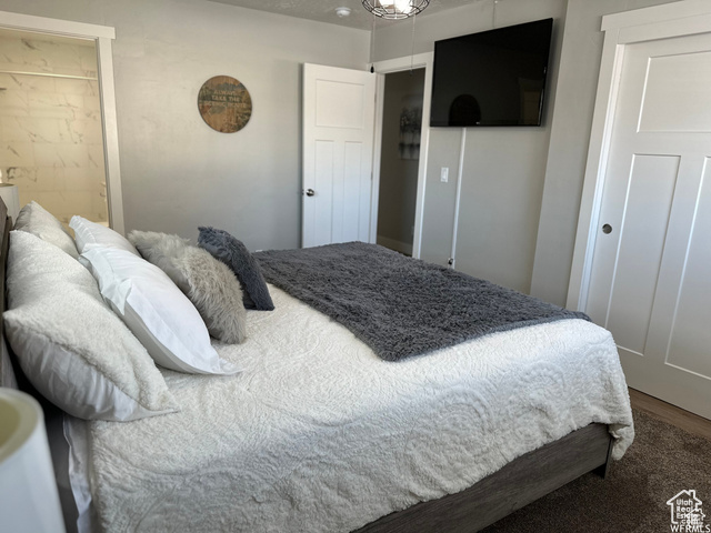 702 North 100 West Logan, UT 84321 - Photo 22 of 58 Bedroom with wood finished floors