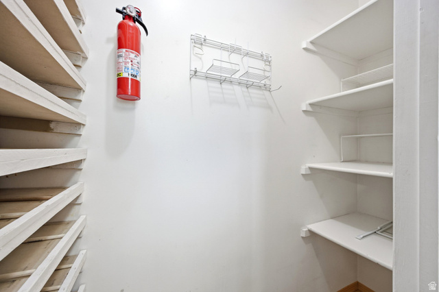 734 Sandy Dunes Drive Sandy, UT 84094 - Photo 10 of 36 Large Pantry with white walls and built-in shelving