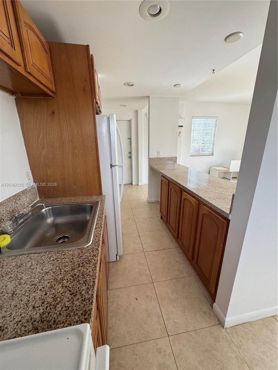 7130 Rue Versailles Drive, Unit 11 Miami Beach, FL 33141 - Photo 4 of 16