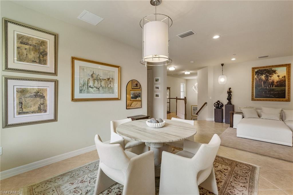 6510 Monterey Point, Unit 204 Naples, FL 34105 - Photo 10 of 48 a view of a dining room with furniture