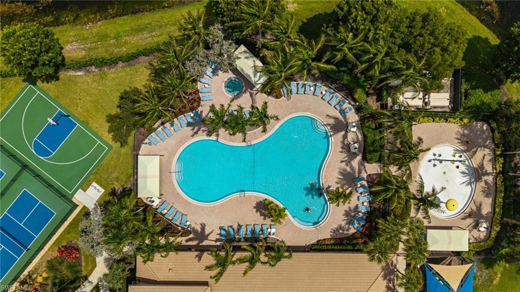 6510 Monterey Point, Unit 204 Naples, FL 34105 - Photo 42 of 48 View of the pool and tennis courts