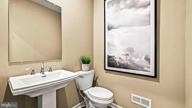 a bathroom with a sink and a toilet