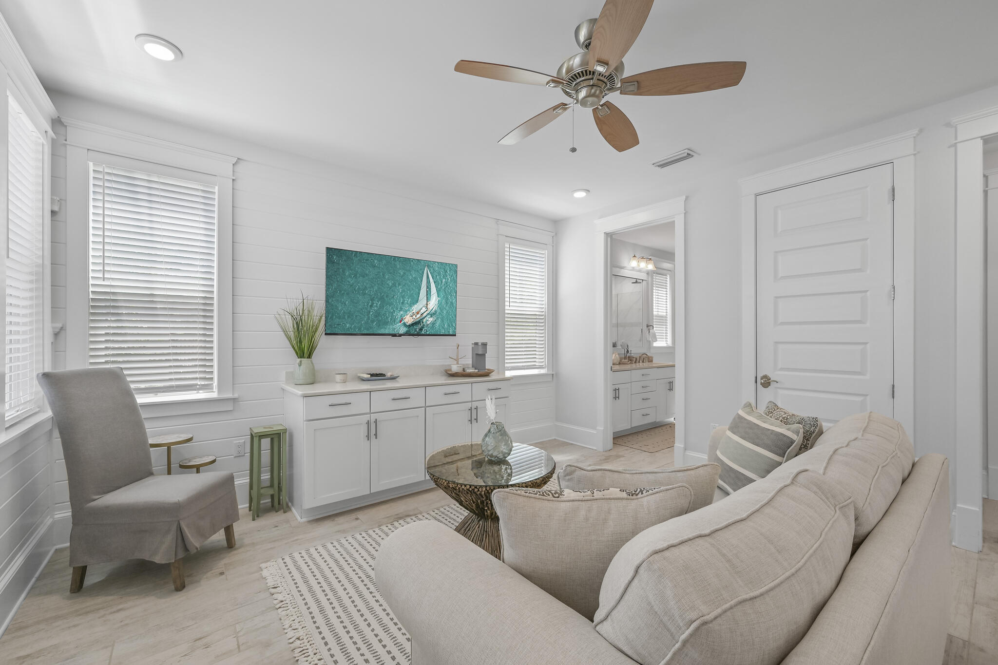 21 Pleasant St Inlet Beach Inlet Beach, FL 32461 - Photo 17 of 37 a living room with furniture and a flat screen tv