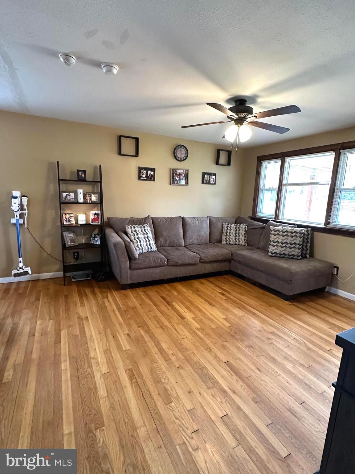 6642 Bucknell Road Bryans Road, MD 20616 - Photo 2 of 17 a living room with furniture and a flat screen tv