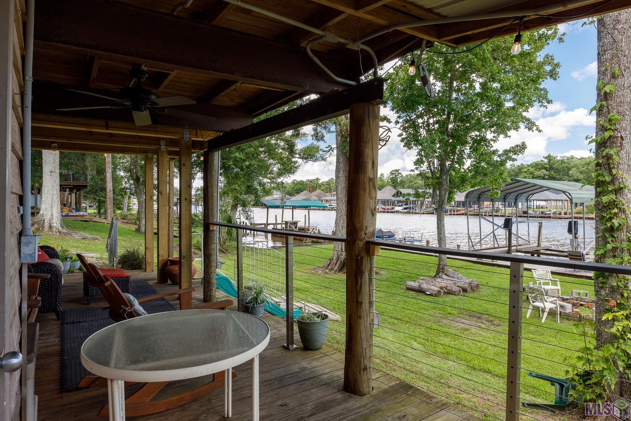 21054 Diversion Canal Road St. Amant, LA 70774 - Photo 26 of 48 Lower Covered Deck