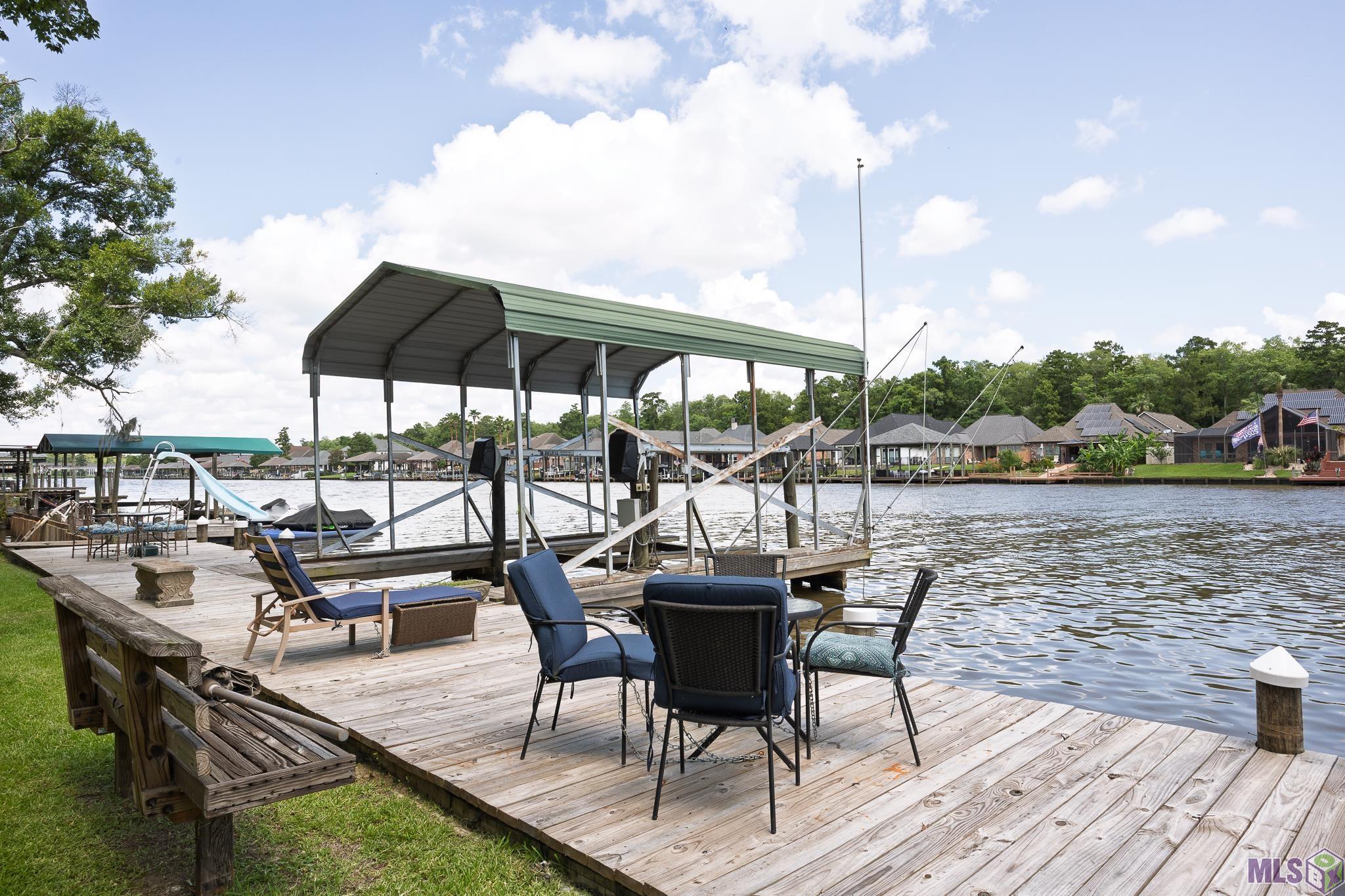 21054 Diversion Canal Road St. Amant, LA 70774 - Photo 30 of 48 63' of Waterfront Deck!