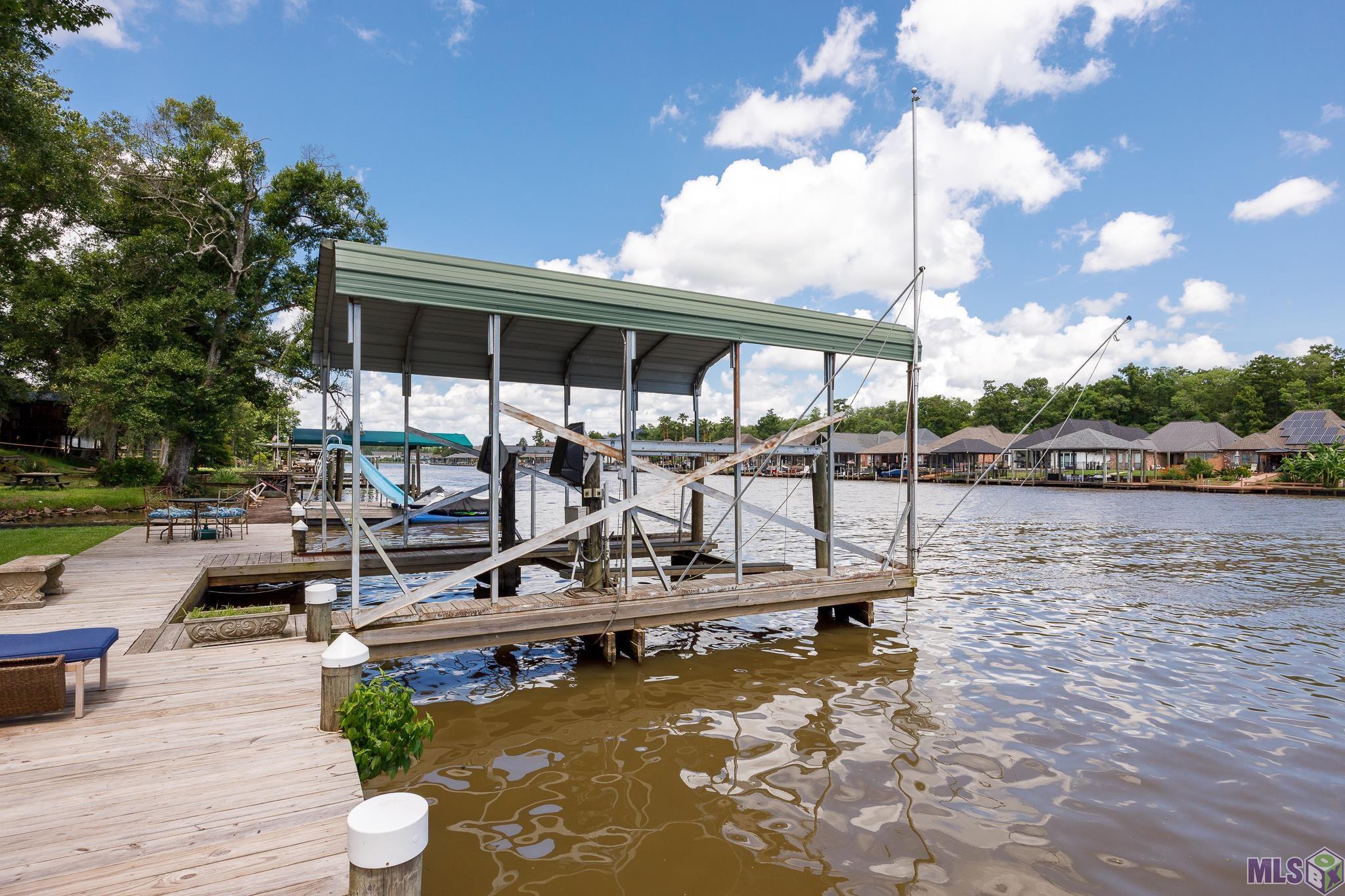 21054 Diversion Canal Road St. Amant, LA 70774 - Photo 31 of 48 Covered Boat Lift
