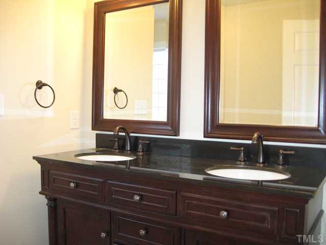 5596 Brogden Road Smithfield, NC 27577 - Photo 3 of 12 Gorgeous master bath with dual vanity areas & tile floor
