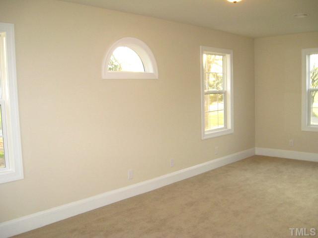 5596 Brogden Road Smithfield, NC 27577 - Photo 7 of 12 Second bedroom with walk-in closet