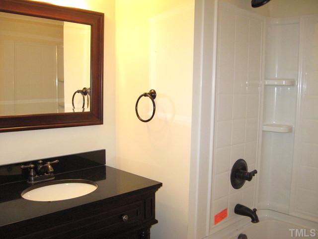 5596 Brogden Road Smithfield, NC 27577 - Photo 8 of 12 Second full bath with tile floor