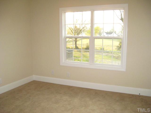 5596 Brogden Road Smithfield, NC 27577 - Photo 9 of 12 Third bedroom with walk-in closet
