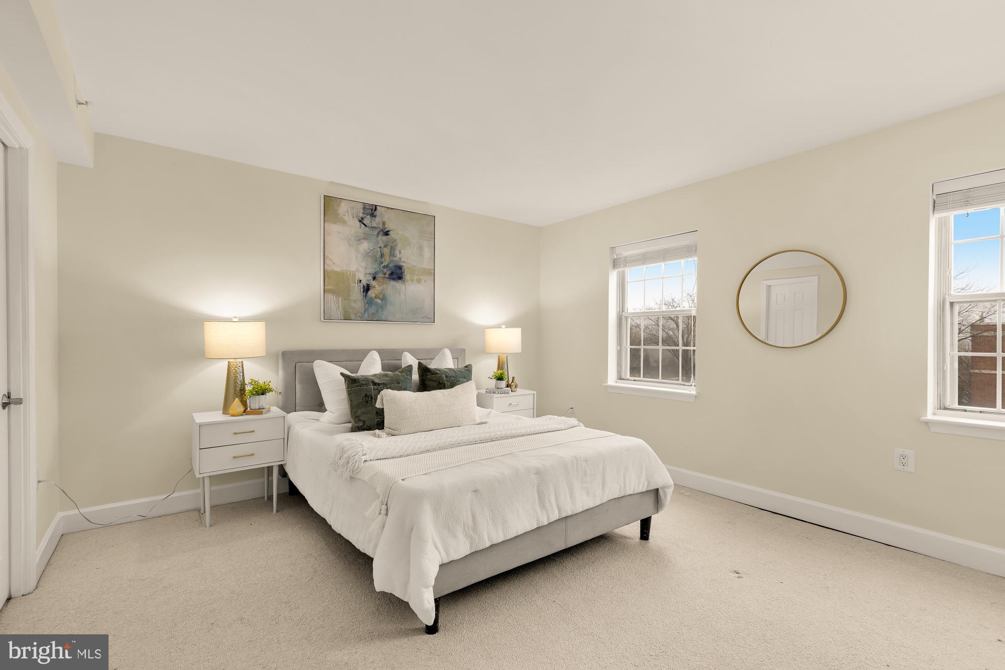 3804 Rodman Street Northwest, Unit 303 Washington, DC 20016 - Photo 27 of 33 a bedroom with a bed and a window