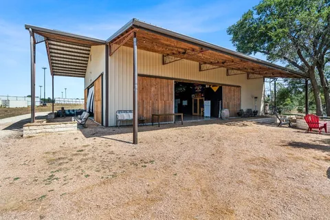 a building outdoor space with patio furniture