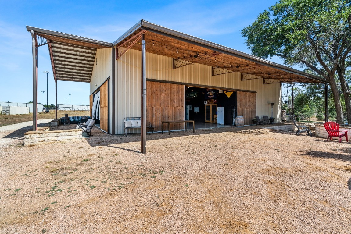 7394 Creek Road Dripping Springs, TX 78620 - Photo 28 of 39 a view of a house with a outdoor space