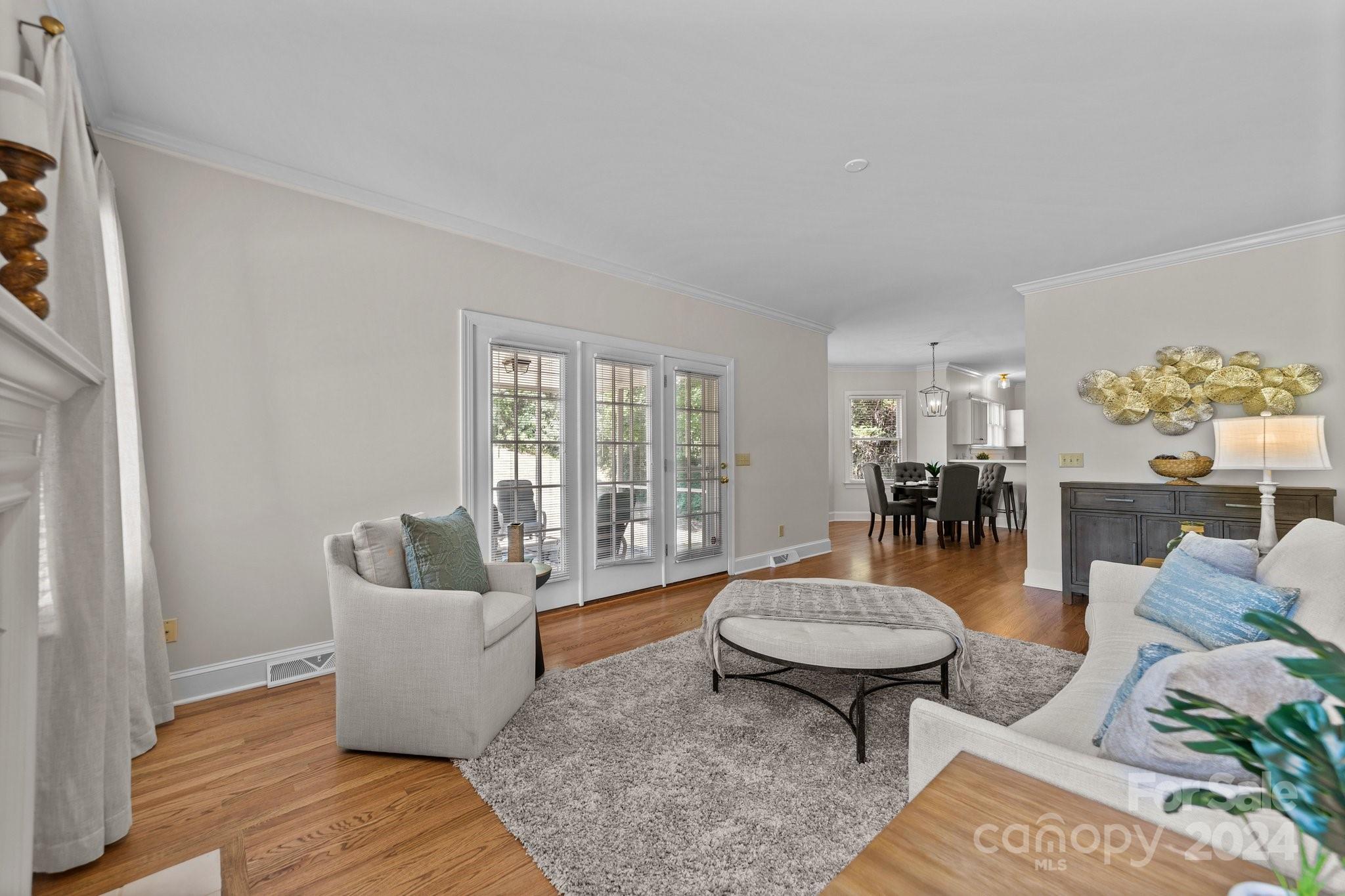 101 North Kimberly Road Davidson, NC 28036 - Photo 13 of 38 a living room with furniture and a wooden floor
