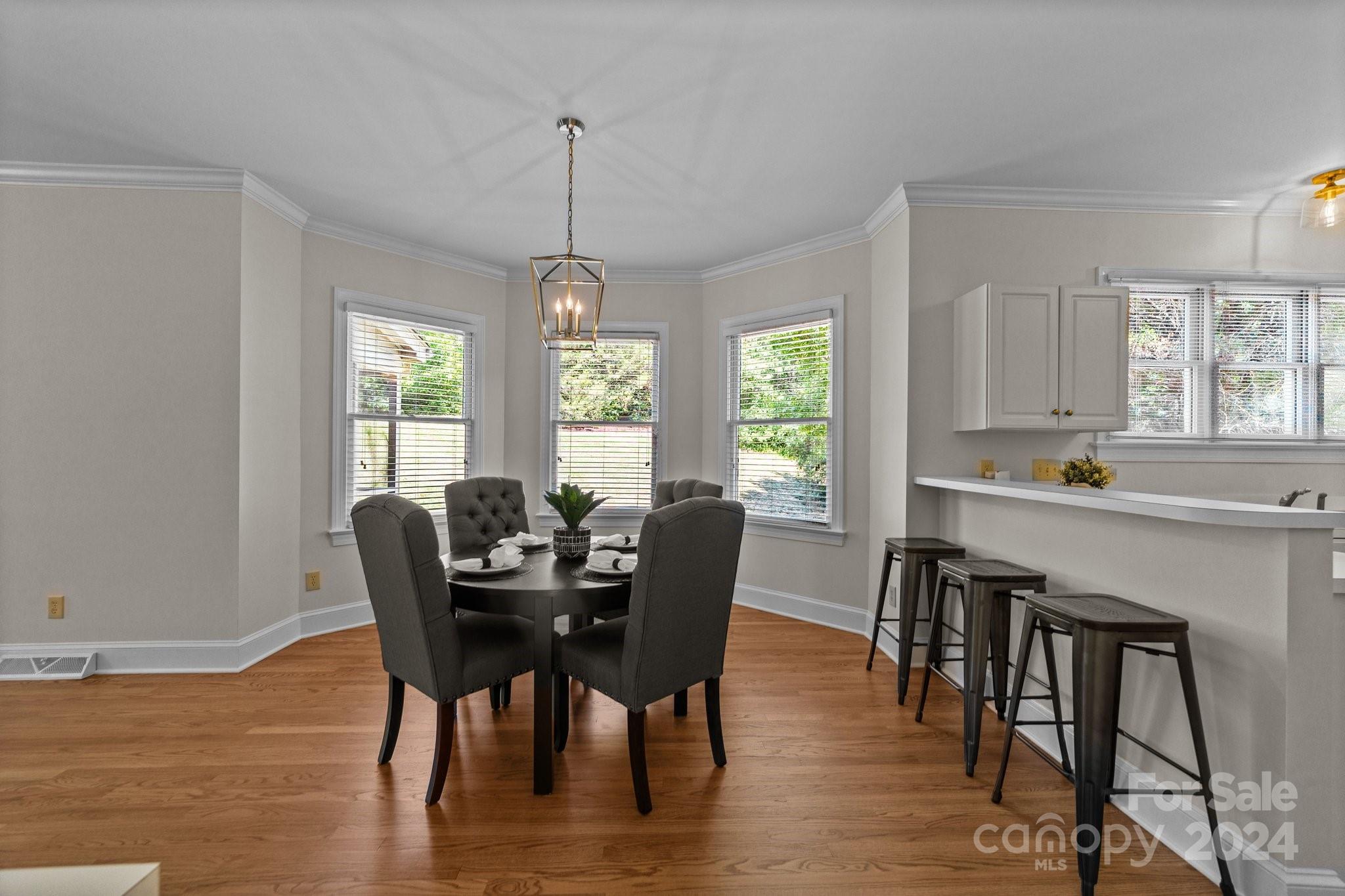 101 North Kimberly Road Davidson, NC 28036 - Photo 15 of 38 a view of a dining room with furniture window and outside view