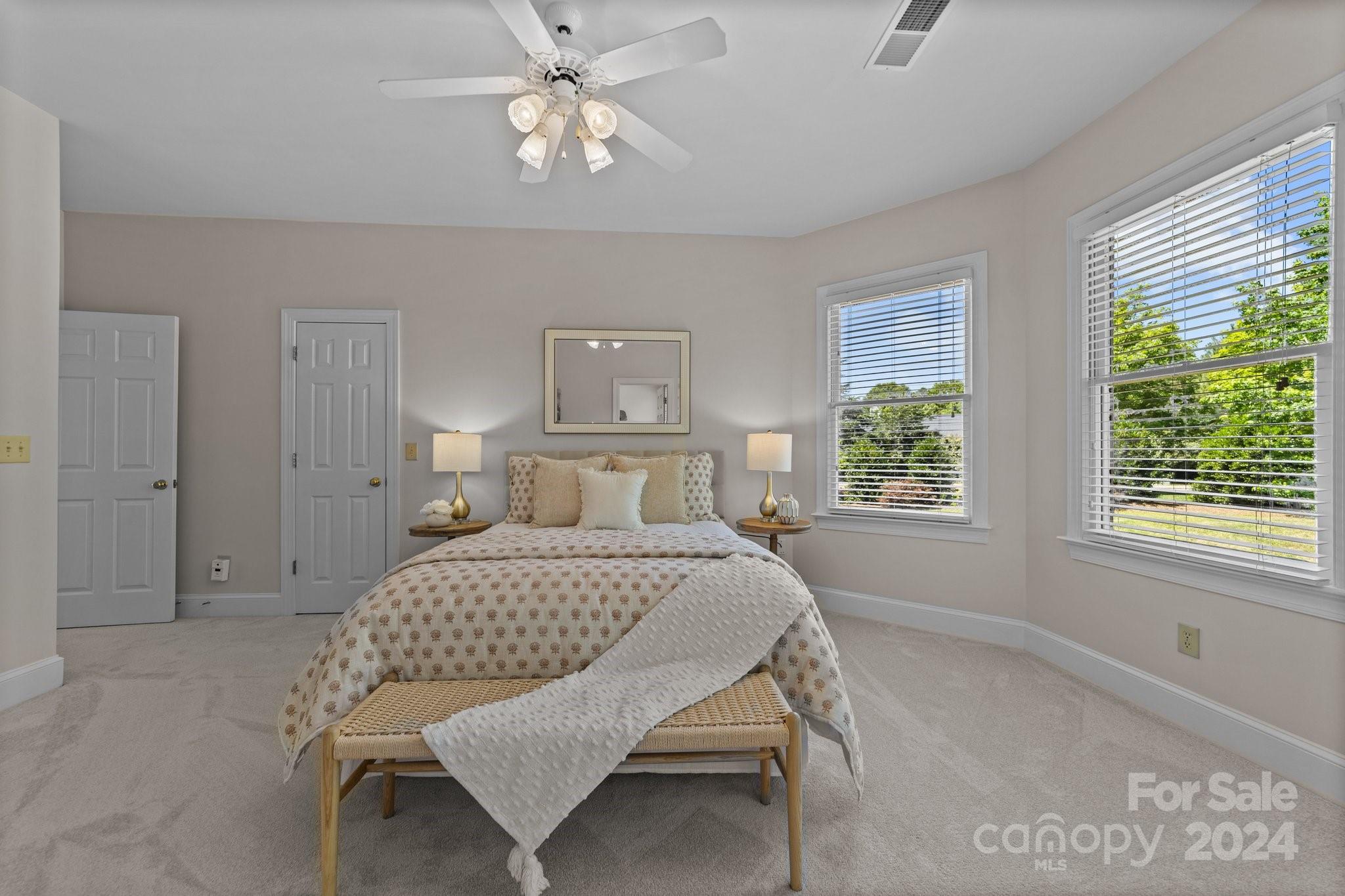 101 North Kimberly Road Davidson, NC 28036 - Photo 21 of 38 a bedroom with a bed and a window