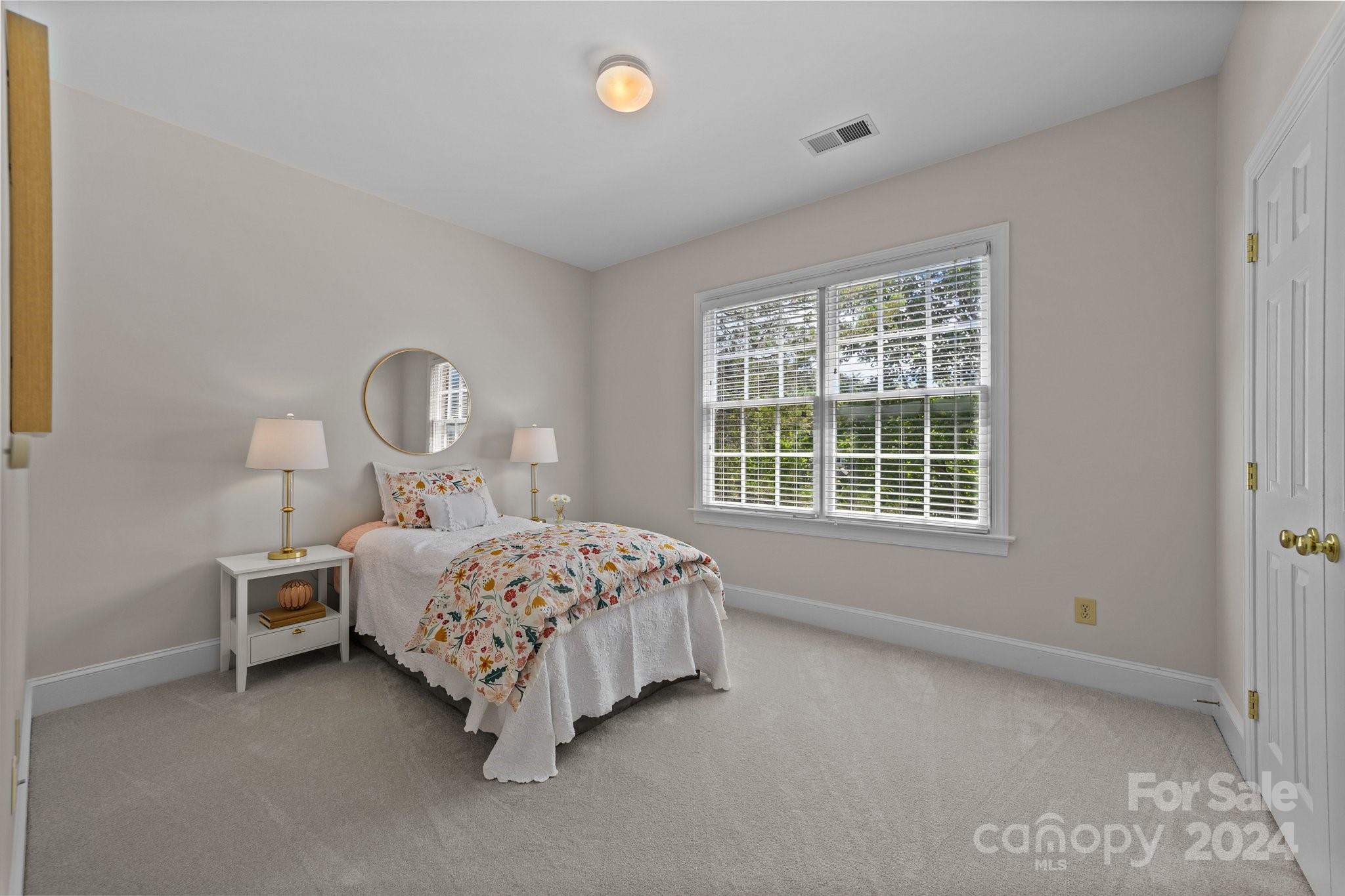 101 North Kimberly Road Davidson, NC 28036 - Photo 24 of 38 a bed room with a bed and window