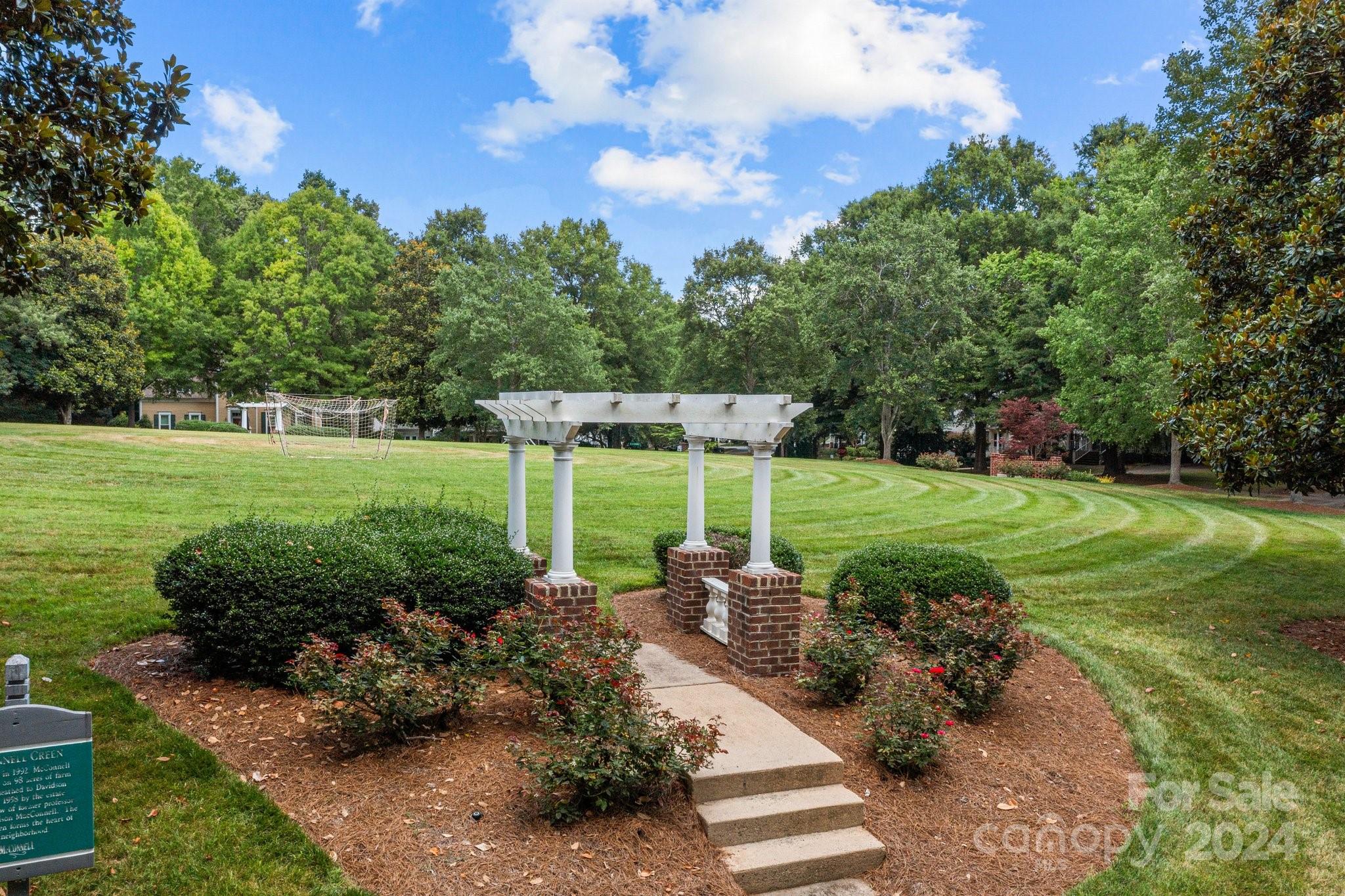 101 North Kimberly Road Davidson, NC 28036 - Photo 31 of 38 a view of a garden with lawn chairs