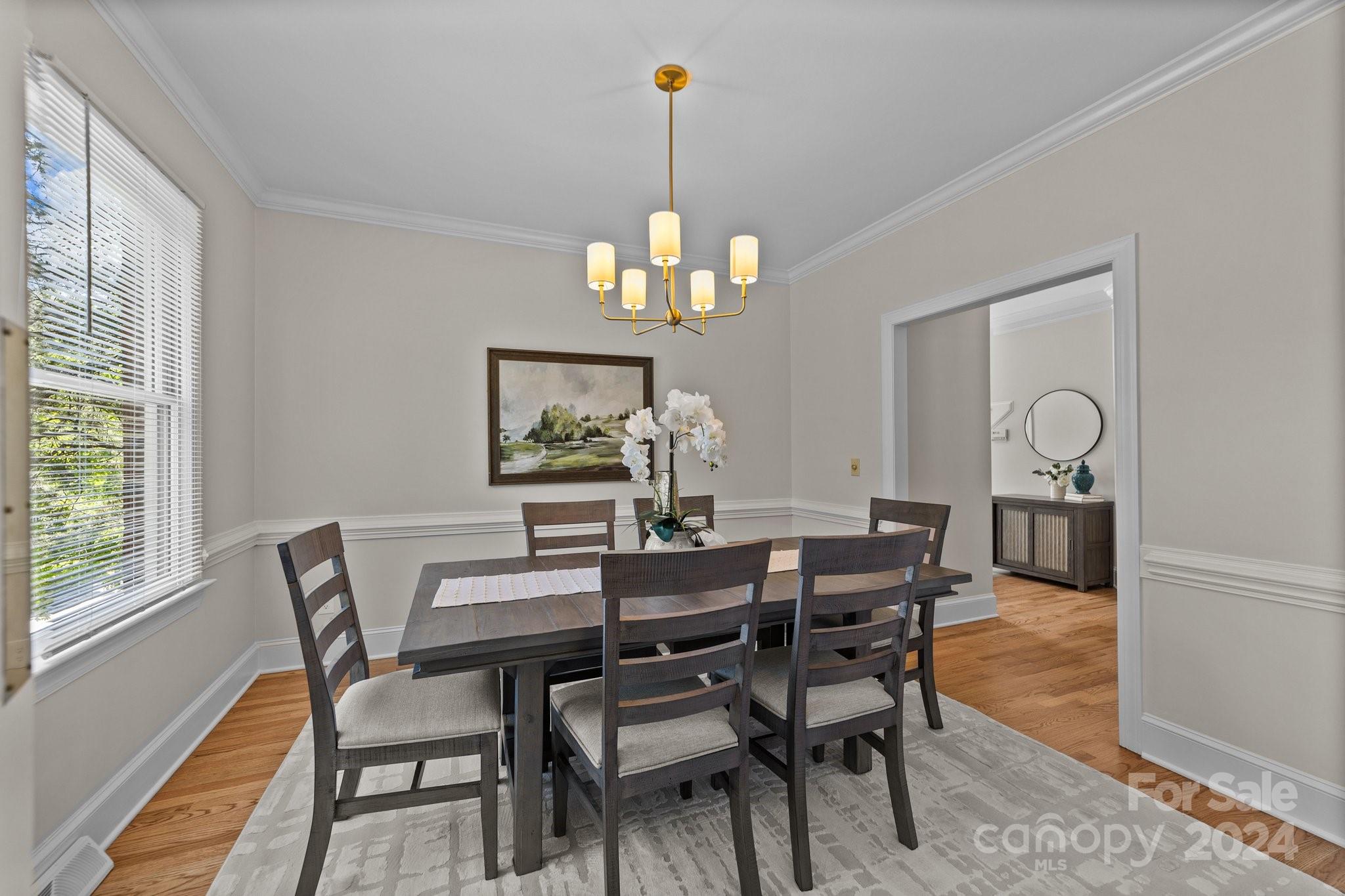 101 North Kimberly Road Davidson, NC 28036 - Photo 7 of 38 a view of a dining room with furniture window and wooden floor
