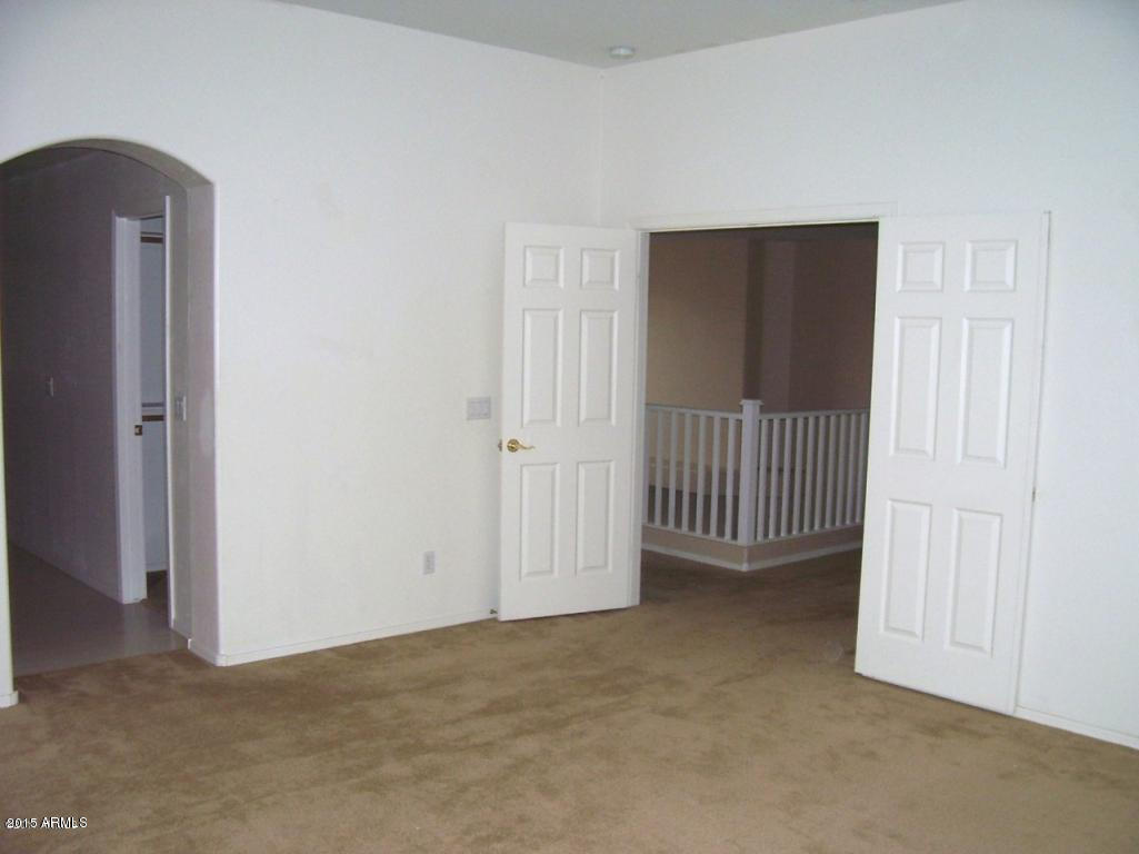 13643 West Calavar Road Surprise, AZ 85379 - Photo 15 of 17 Master Bedroom