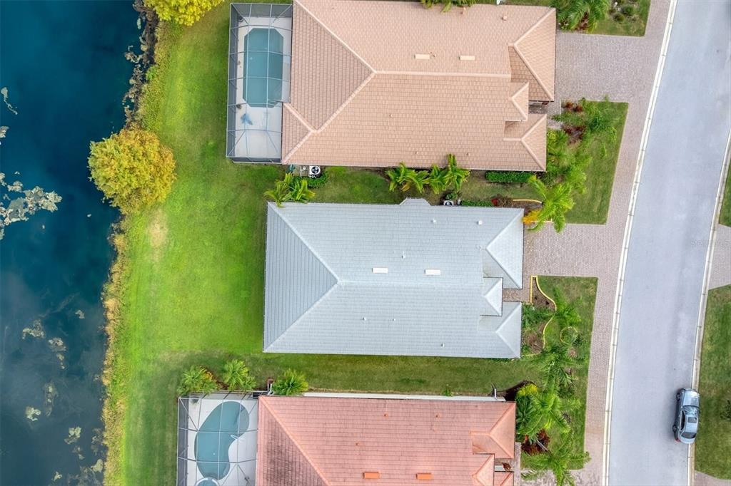 7909 Rio Bella Place Bradenton, FL 34201 - Photo 24 of 34 an aerial view of a house with a yard