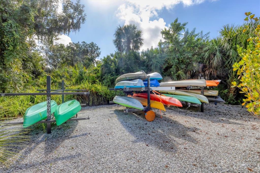 7909 Rio Bella Place Bradenton, FL 34201 - Photo 29 of 34 a view of yard with green space and seating area