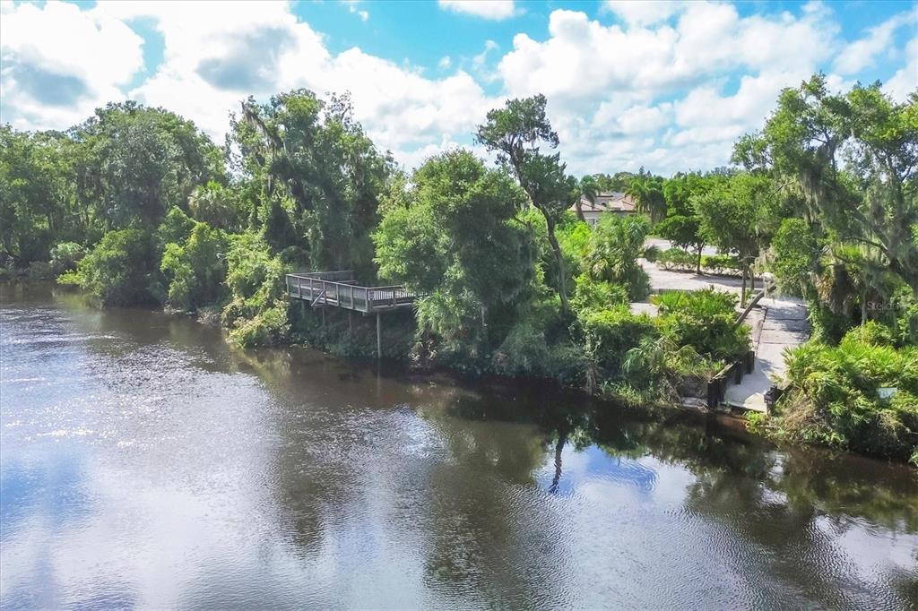 7909 Rio Bella Place Bradenton, FL 34201 - Photo 35 of 38 a view of a water pond with lots of green space