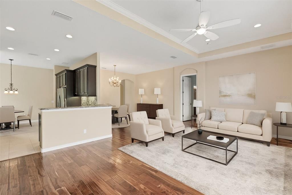 7909 Rio Bella Place Bradenton, FL 34201 - Photo 4 of 38 a living room with furniture and a large window