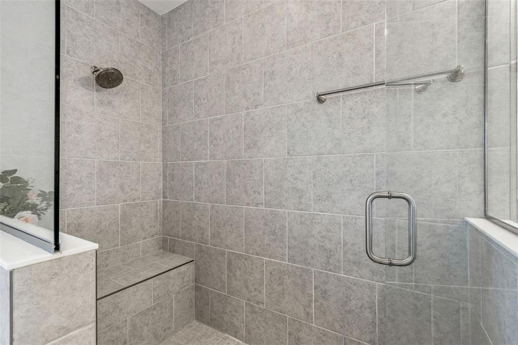 10863 Rustic Timber Loop San Antonio, FL 33576 - Photo 42 of 56 a bathroom with a shower