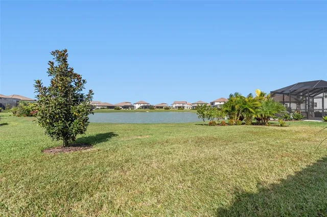 a view of a swimming pool and lake