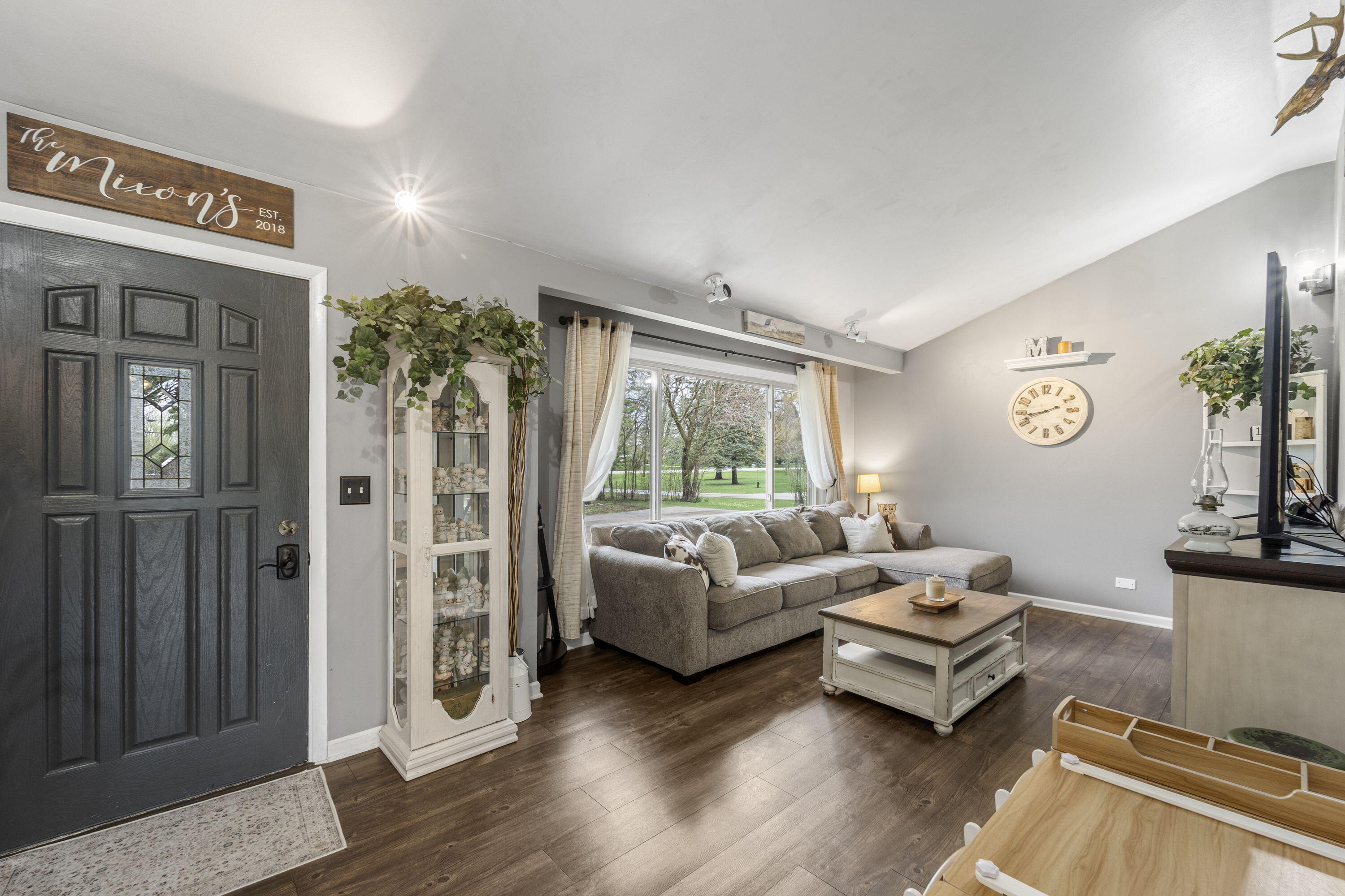 827 South Fancher Road Mount Pleasant, WI 53406 - Photo 6 of 26 Inviting living area with neutral tones, open flow, and ideal setup for everyday living.